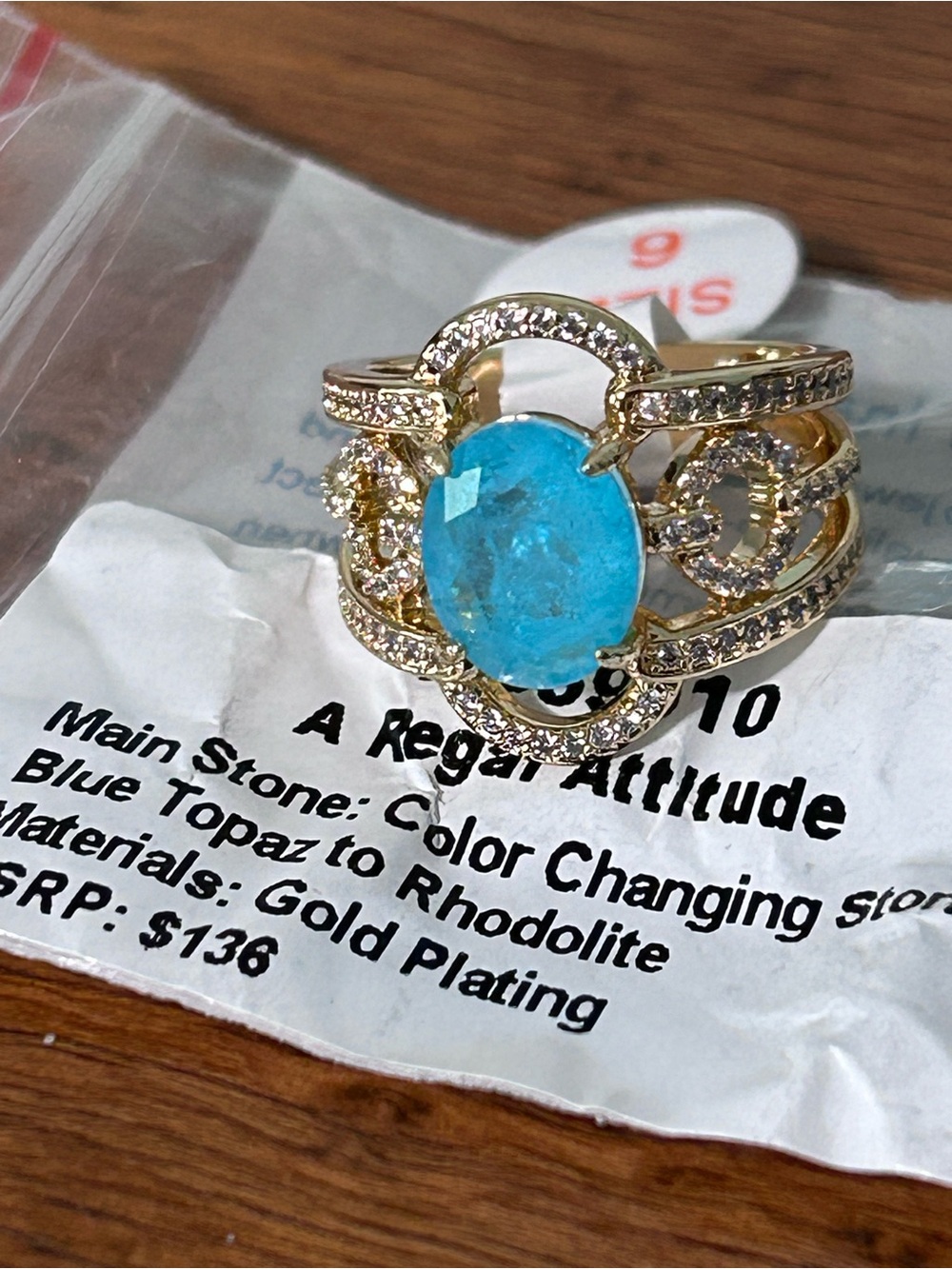 Gold-Plated Ring with Bright Blue Topaz Center and Pavé Accents